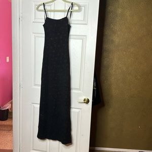 Lightly sequined dress with side slit